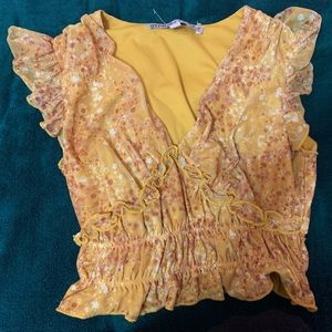 yellow floral v-neck blouse